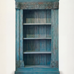 Blue distressed bookshelf with decorative elements on a white background