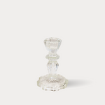 Clear glass candle holder on a white background