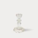 Clear glass candle holder on a white background