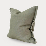 Khaki Green pillow with a textured edge on a white background
