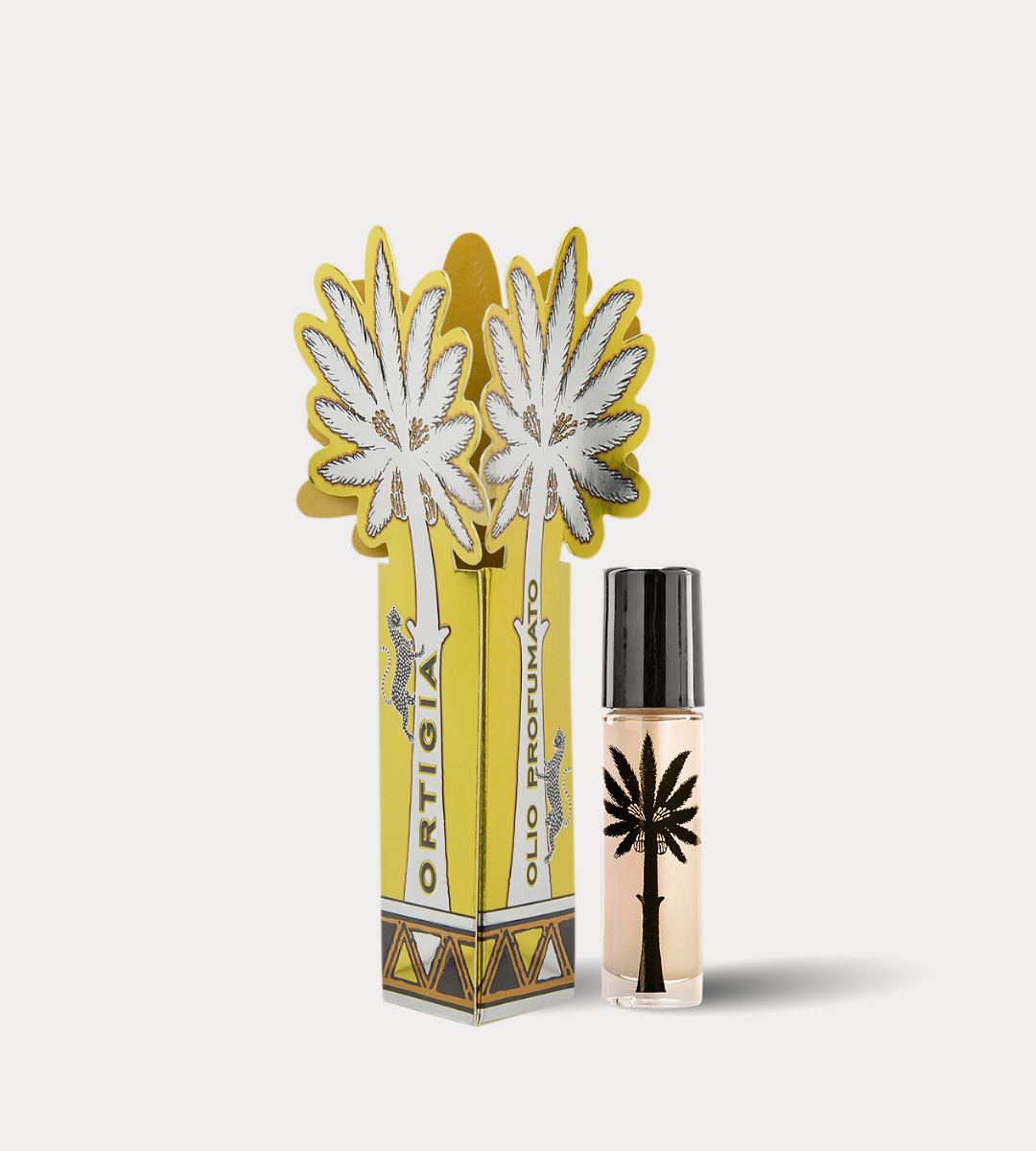 Perfume bottle with decorative packaging on a white background