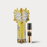Perfume bottle with decorative packaging on a white background