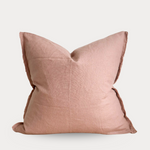 Pink pillow on a light gray background