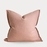 Pink pillow on a light gray background