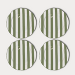 Four green and white striped plates on a light gray background